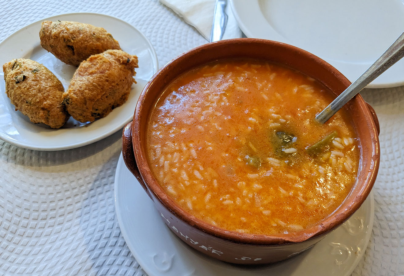 Tomato rice with bolinhos de bacalhau cover