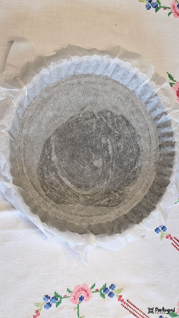 Tart pan lined with parchment paper