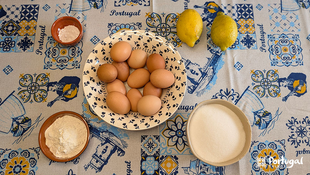 a table with some ingredients for making lemon pie, such as eggs, lemons, sugar, flour, and others