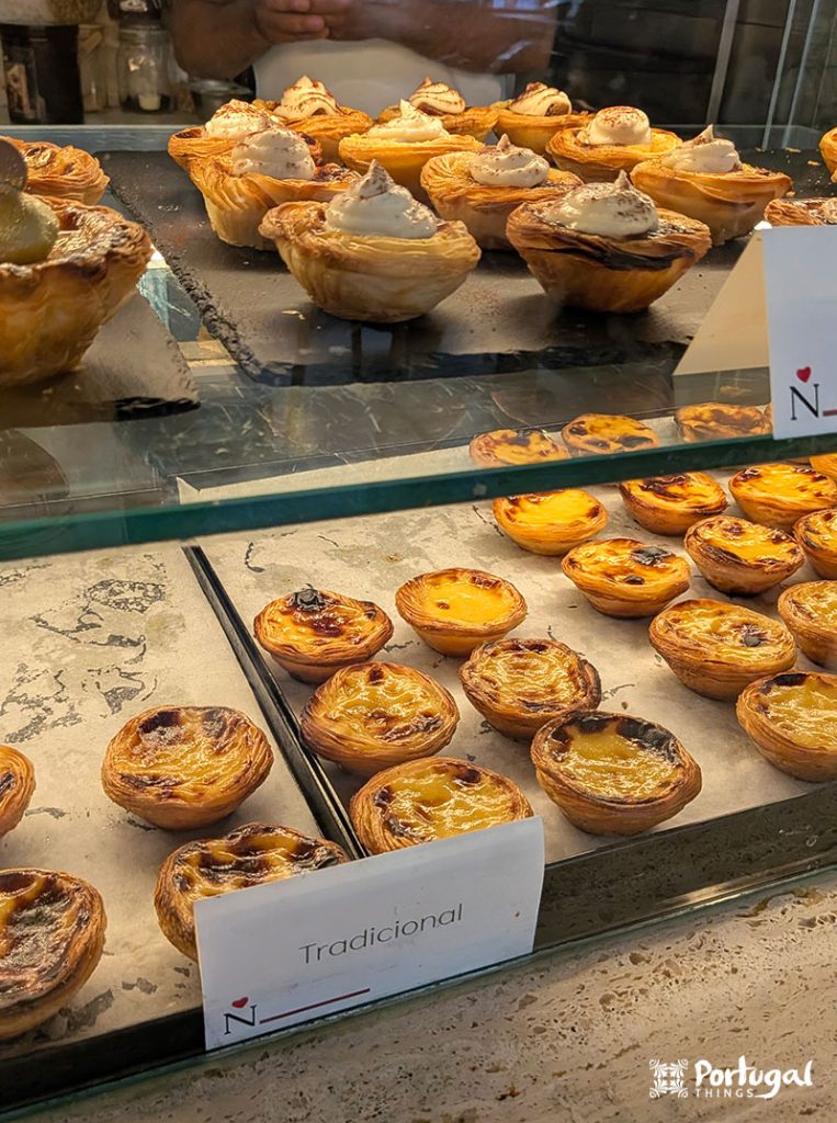Traditional and meringue-topped pastéis de nata at Nat'elier in Lisbon