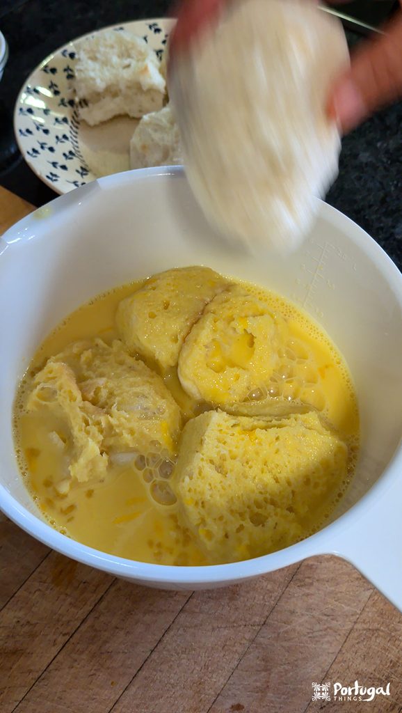 Rabanadas Poveiras – Traditional Portuguese Recipe from Póvoa de Varzim 8 a container with several loaves of bread soaked in milk and egg yolks