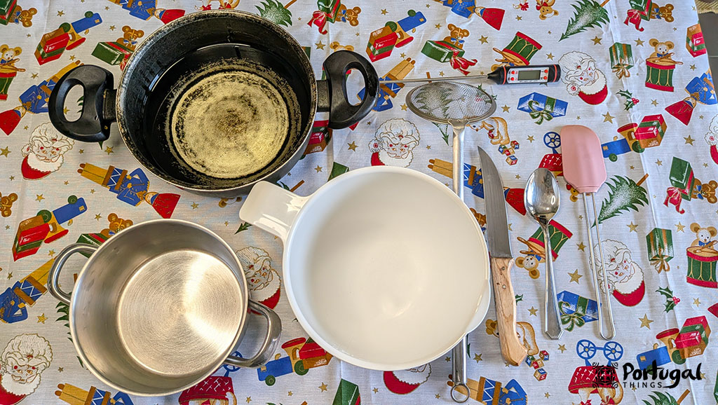 Rabanadas Poveiras – Traditional Portuguese Recipe from Póvoa de Varzim 2 a table with pots, container, spatula, spoon - utensils to make Rabanadas Poveiras